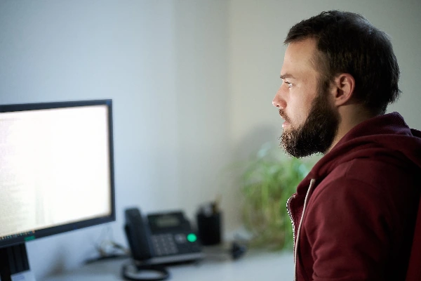Software developer at a workstation